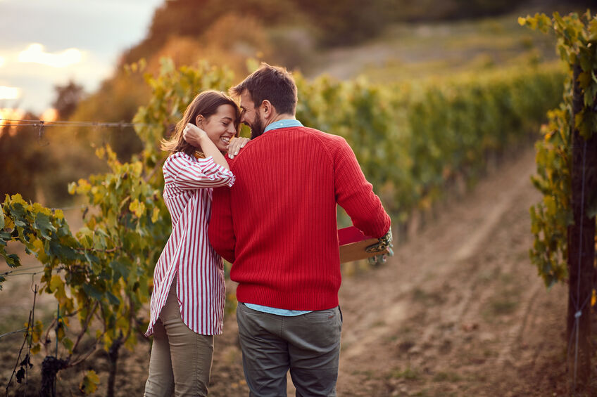 Smiling Couple in the vineyard